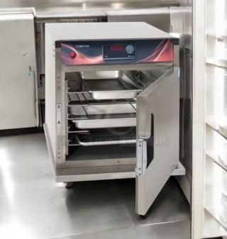 Cres Cor H137SUA5D warming cabinet, excellent condition, stainless steel, open door showing interior racks, 120V AC, fully tested.