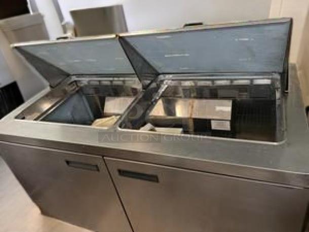 Delfield 2-door sandwich/salad prep table in excellent condition, 115V AC, fully tested and working, with open compartments.
