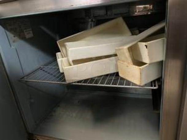 Delfield 2-Door Sandwich/Salad Prep Table, excellent condition, interior view with shelving and containers, 115V AC, fully tested.