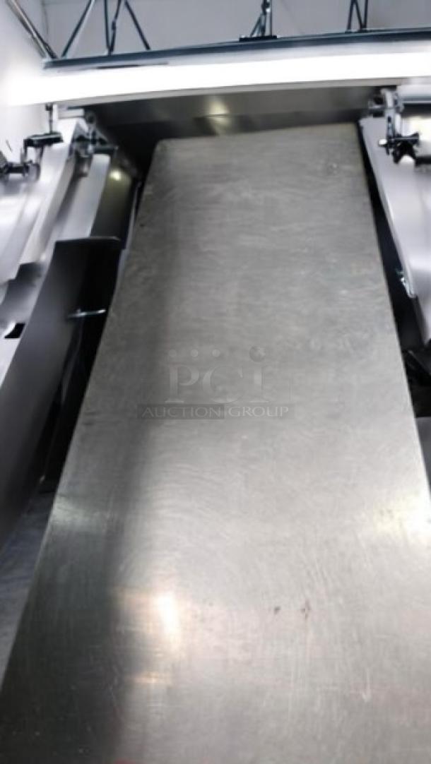 Commercial Stainless Steel Heavy-Duty Work Table, excellent condition, with undershelf. Fully tested and working.