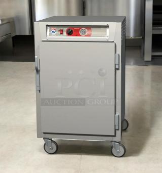 Metro C565-SFS-U Heated Holding Cabinet, excellent condition, 120V, fully tested, red control panel, on casters.