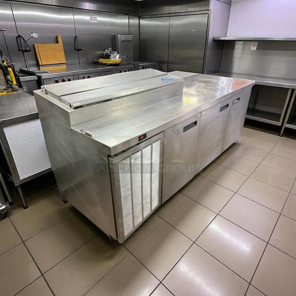 Delfield 3 Door Pizza Prep Table in excellent condition, stainless steel, 115v, tested and working, for sale.