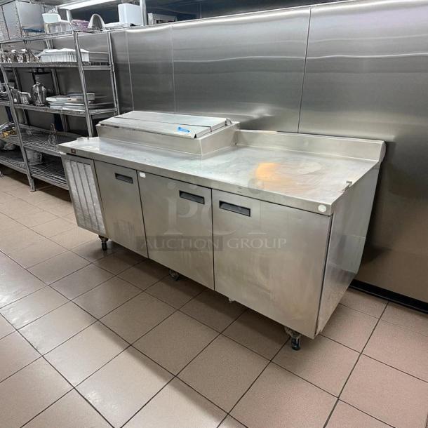 Delfield 3-Door Pizza Prep Table, excellent condition, stainless steel, 115v, tested and working, with undershelf storage.