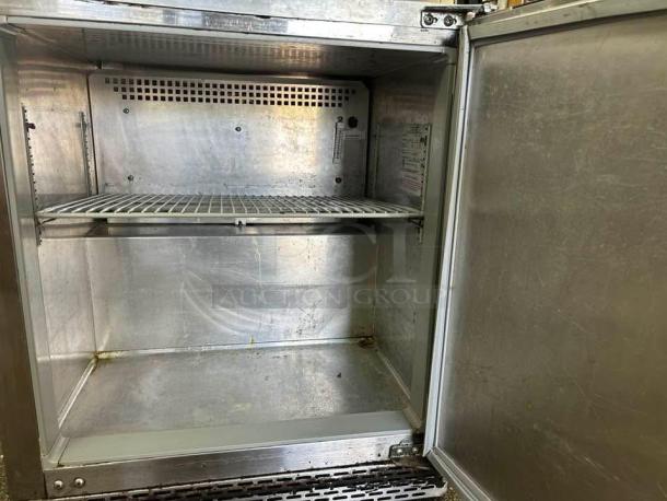 Continental UC27 undercounter refrigerator, stainless steel, excellent condition, 7.4 cu ft, front breathing, tested working.