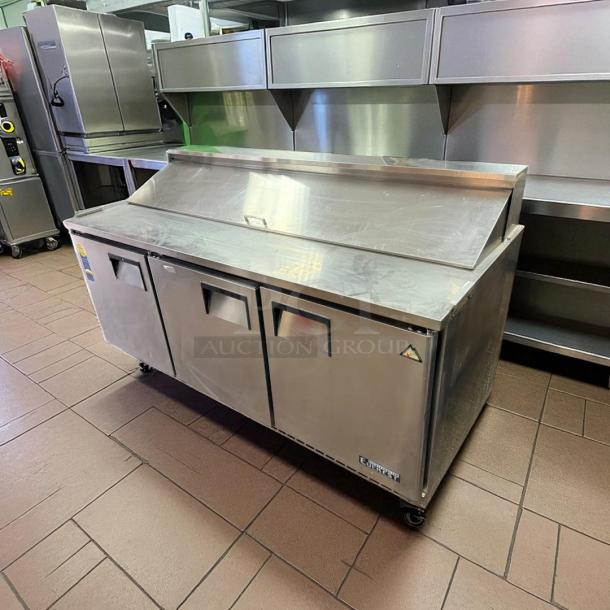 Everest EPBNR3 3-door refrigerated sandwich prep table in excellent condition, stainless steel, 115V, fully tested.