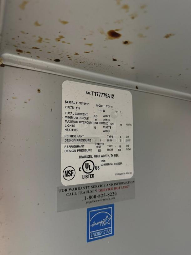 Alt Text: Traulsen Commercial Freezer Model G12010 label, NSF certified, Energy Star, excellent condition, fully tested.