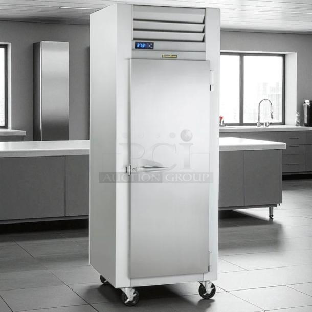 Traulsen Commercial Freezer G12010, excellent condition, fully tested, stainless steel, on casters, digital display visible.