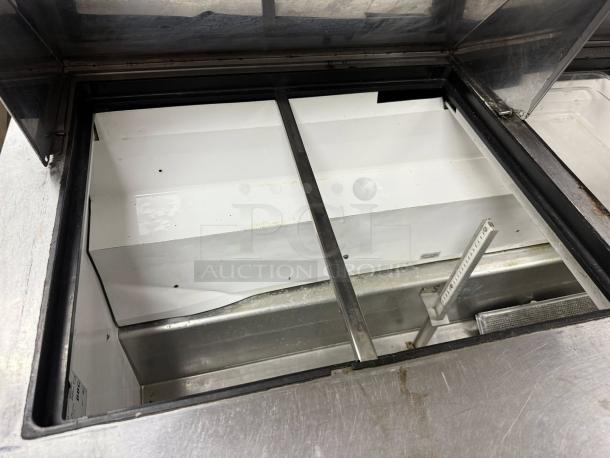 True TSSU-60-16-HC 60in stainless prep cooler, 15.5 CuFt, tested and working. Clean interior, visible temperature gauge.