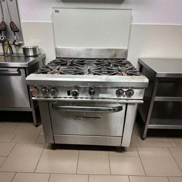 Southbend S36D 36" 6 burner gas range with standard oven, natural gas, in great condition; tested and working, clean stainless steel finish.