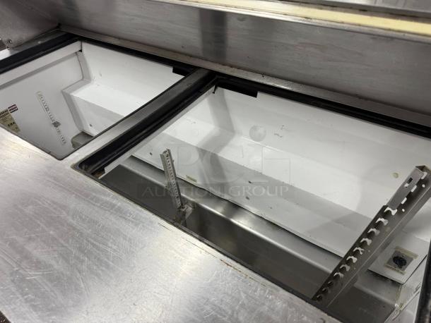 True TSSU-60-24M-B-ST Mega Top Prep Table, stainless steel, tested, refrigerated base. Ideal for sandwich/salad prep.