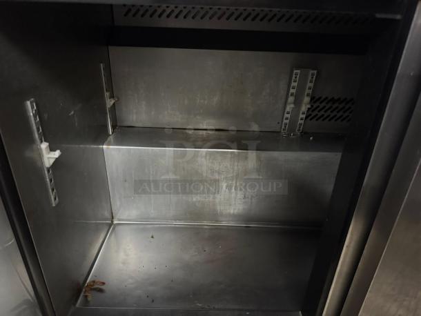 Titan 72" 3-door sandwich prep table interior, model XTSU72, in great condition; tested and working.