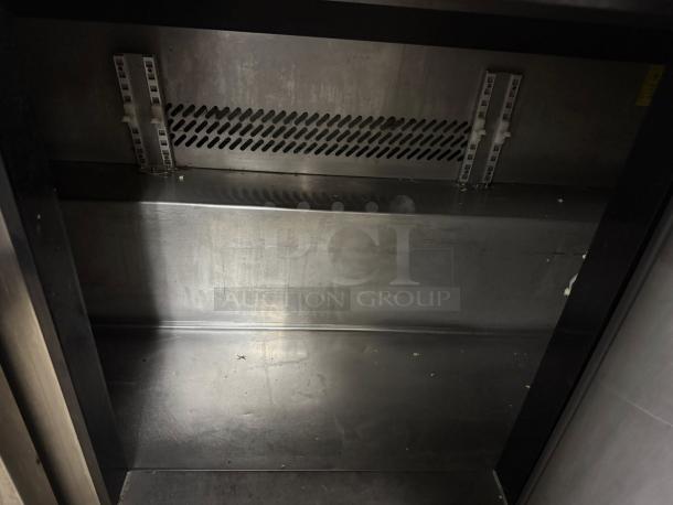 Titan XTSU72 Sandwich Prep Table, 72", three doors, 115v, tested working, great condition, stainless steel interior.