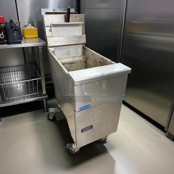 Pitco SG14-S natural gas stainless steel floor fryer, 40-50 lb. capacity, 110,000 BTU, tested and working, with visible wear.