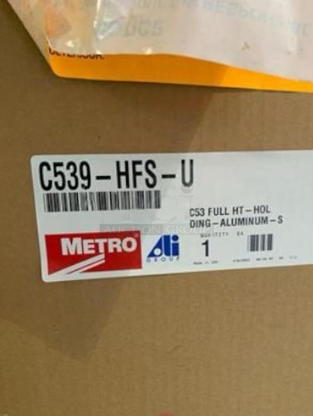 Brand new Metro C539-HFS-U full-height heated holding cabinet label, indicating aluminum material, 120V, tested and ready for use.