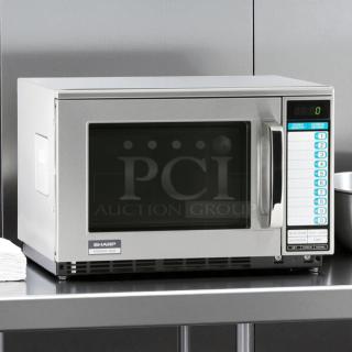 Sharp R-22GTF commercial microwave oven, 1200 watts, stainless steel, digital keypad, tested and working condition.