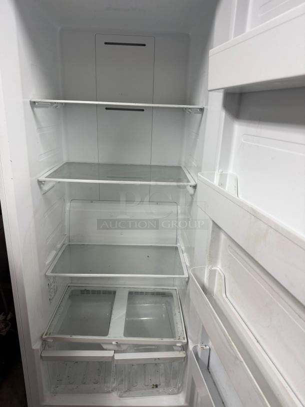 Insignia 21 Cu. Ft. Convertible Upright Freezer, Model 23G14T, white, garage ready, ENERGY STAR certified, tested working.