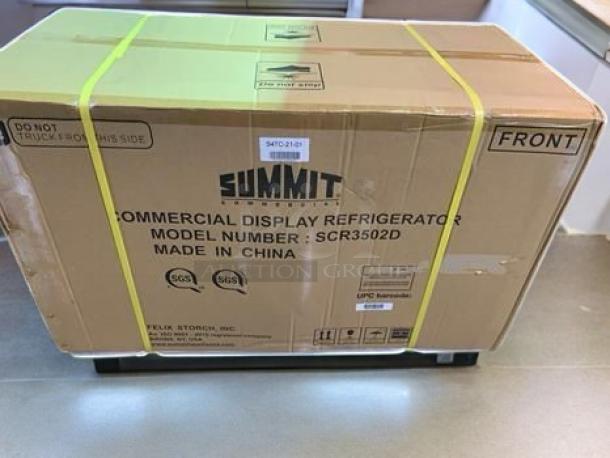 Summit SCR3502D commercial display refrigerator in original packaging. Features double glass doors, LED top panel.