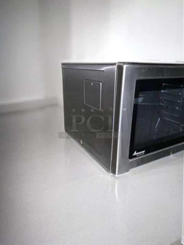Amana RFS12MP-SA commercial microwave oven in outstanding condition, black finish, 120V, fully tested and working.