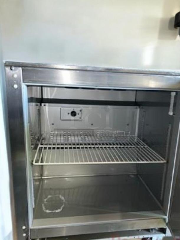 Beverage-Air UCR27A undercounter refrigerator, excellent condition, stainless steel interior, wire shelf, 115V, fully tested.