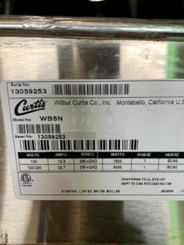 Wilbur Curtis WB5N 5-gallon electric hot water dispenser, excellent condition, model and asset details on label, 120/220V tested.