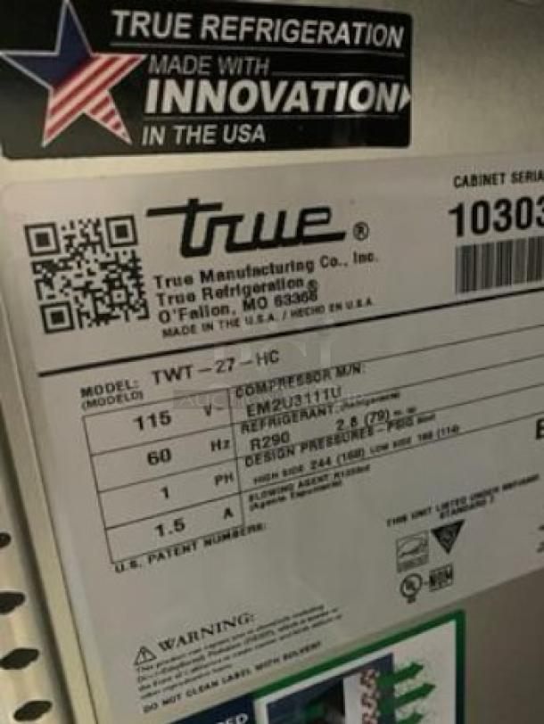 Label of True TWT-27-HC Worktop Refrigerator, showing model, voltage, refrigerant type, serial number, and manufacturing details.