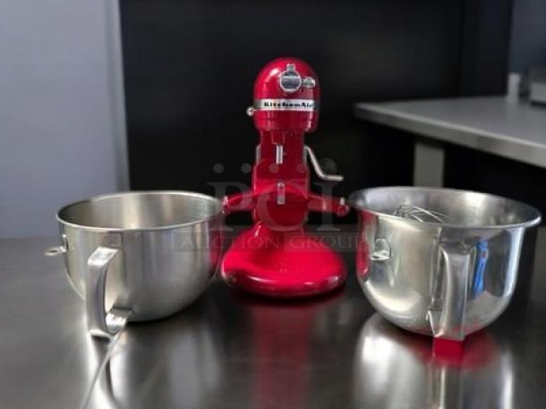 KitchenAid KSM6573CER2 Professional 6000 HD red stand mixer with two stainless steel bowls in excellent condition.