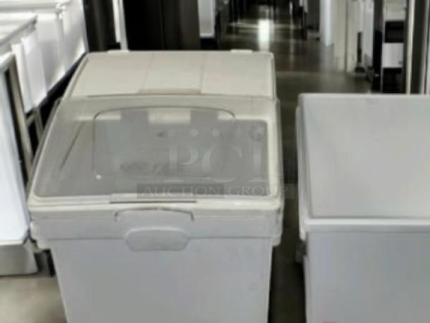 Commercial Kitchen Grade ingredient storage bins, quantity 3, on casters with hinged lids. Great condition, fully tested.