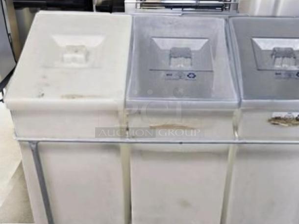 Faribo Ingredient 3-Bin Cart with stainless steel frame, sliding covers, and casters. Good condition, fully tested, mobile storage.