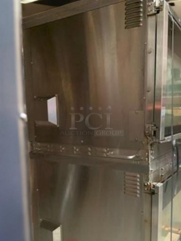 Hardt Inferno 4500 rotisserie oven, natural gas, V-type skewers, stainless steel, excellent condition.