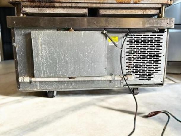 Traulsen VE048HT 2-drawer refrigerated chef base in outstanding condition, 115V, fully tested and working, with visible electrical components.