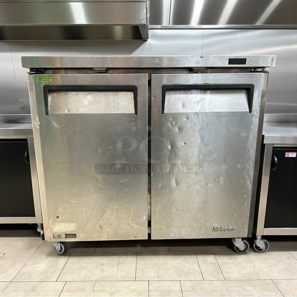Turbo Air MUF-36-N undercounter freezer, 36 1/4" wide, two sections and doors, stainless steel, excellent condition, tested.