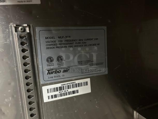 Turbo Air MUF-36-N label, model specifications, voltage, refrigerant info in excellent condition, auction item.
