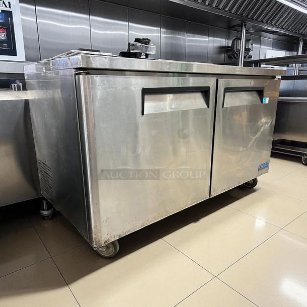 Turbo Air MUR-60 undercounter refrigerator, 60", stainless steel, two doors, caster wheels, fully tested and working.