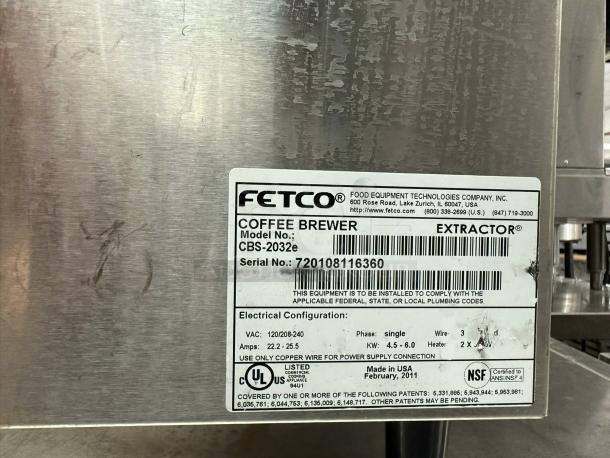 Fetco CBS-2032e Twin Coffee Brewer, excellent condition, 220–240V, fully tested, visible label details model and serial numbers.