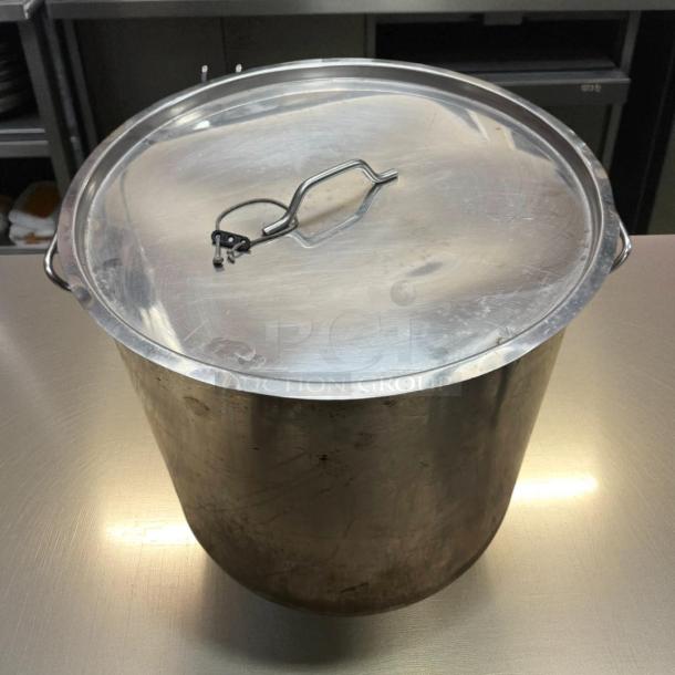 Vollrath 78640 Classic 60 Qt. stainless steel stock pot with lid, 20.5", heavy-duty, quality gauge, used condition.