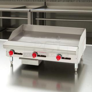 Imperial ITG-36 36" commercial gas griddle with thermostatic controls. Stainless steel, tested and working, excellent condition.