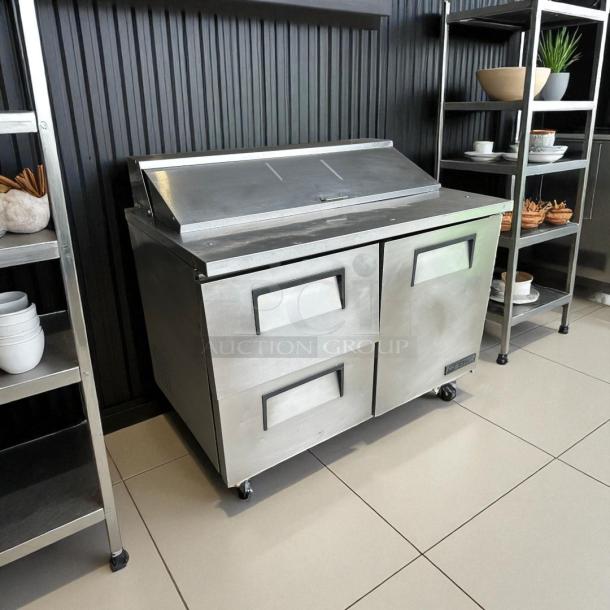 True TSSU-48-12D-2 sandwich/salad prep table, 48", excellent condition, stainless steel, two drawers, 115V, fully tested.