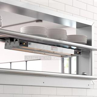 Brand new ServIt 36" strip warmer, single toggle control, 120V, 850W, installed in kitchen setting.