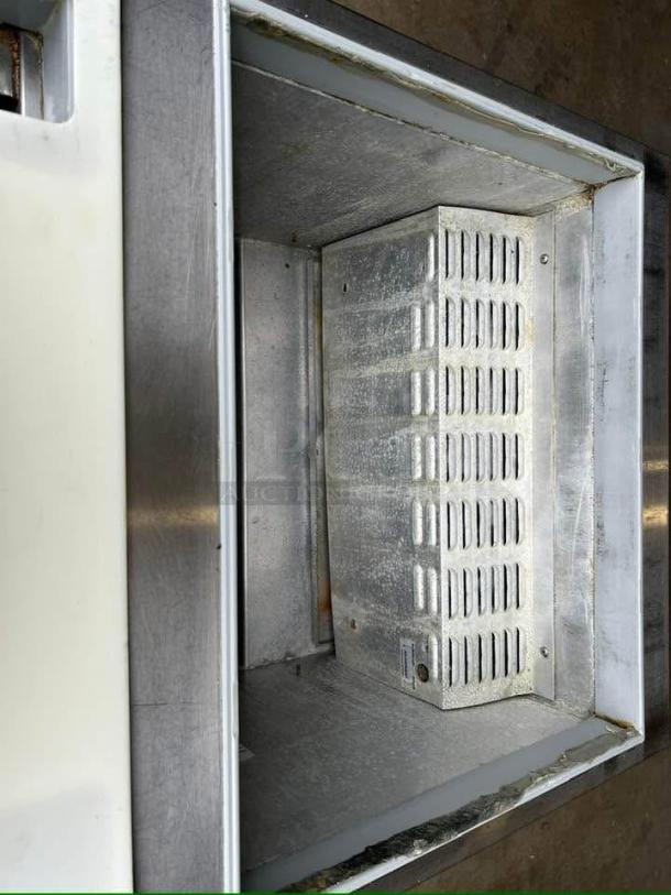 Continental Refrigerator SW27-12M Sandwich Prep Unit, excellent condition, interior view, stainless steel, fully tested.