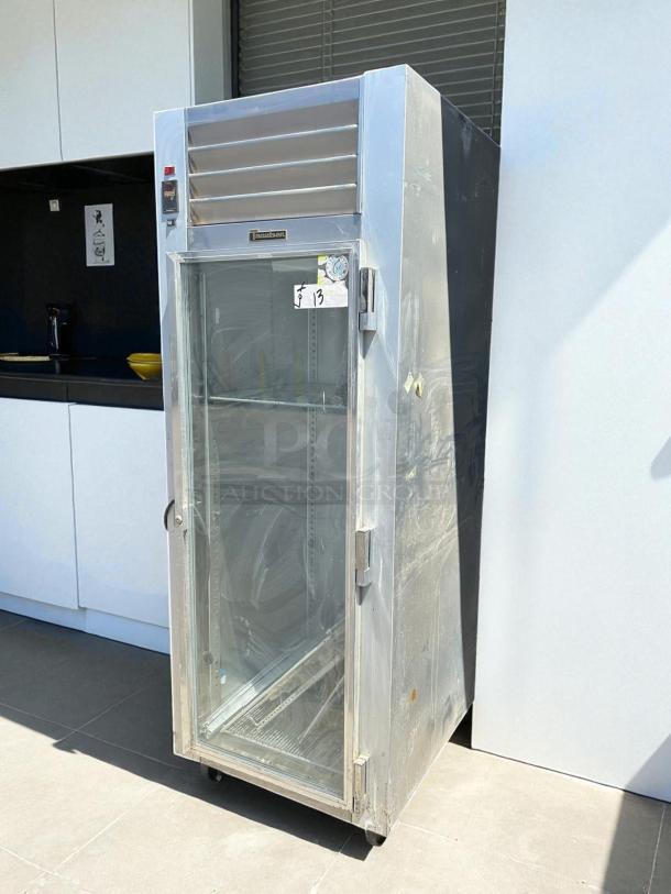 Traulsen G11010 Reach-In Refrigerator, excellent condition, right hinge glass door, tested; model and brand labels visible.