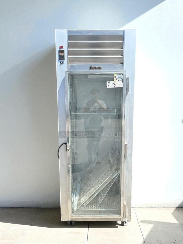 Traulsen G11010 29 7/8" reach-in refrigerator, excellent condition, right hinge glass door, tested, 115v, visible controls.