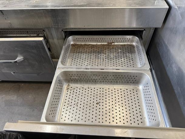 Randell 8272D-290 72" dual-sided pizza prep table with refrigerated base, tested and working, stainless steel trays.