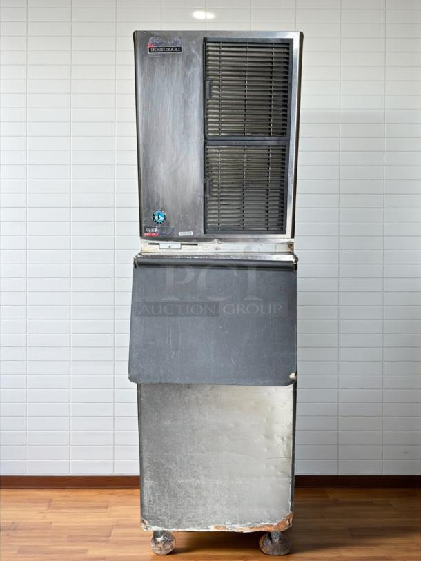 Hoshizaki KM-350MAJ ice machine with 300 lb bin, slim-line design, air-cooled, visible wear, 115v, on casters.