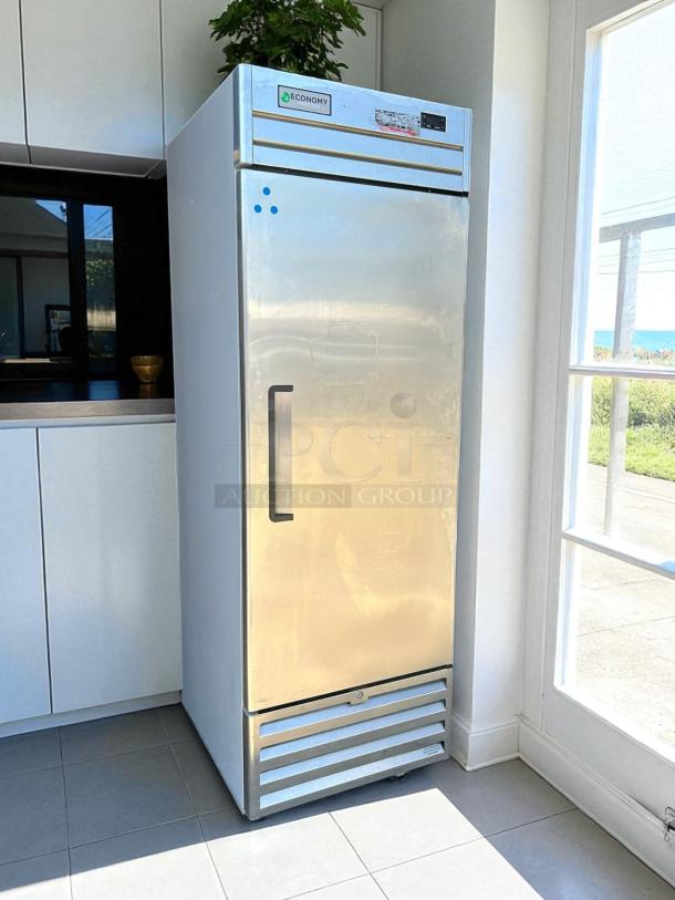 Economy EF1A-FS single door commercial freezer, excellent condition, stainless steel, 115V, fully tested and working.