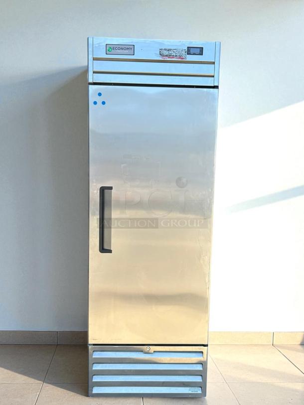 Economy Series EF1A-FS single door commercial freezer, excellent condition, 115V, fully tested, silver exterior.