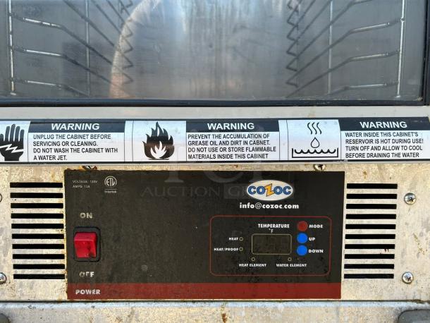 Cozoc Heated Holding Cabinet HPC7008 in excellent condition, fully tested. Features warning labels and temperature controls.
