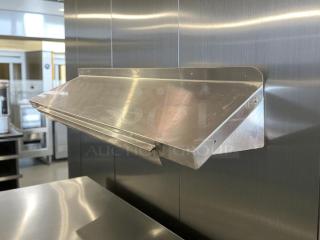 GSW wall mount shelf, 48" x 13.5", stainless steel, excellent condition, ideal for storage or display.