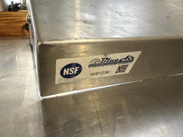 Blue Air WS1236 stainless steel wall shelf, NSF certified, showing model label. Minor surface marks, excellent condition.
