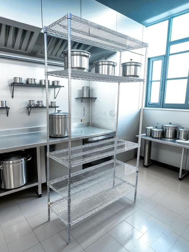 GSW wire shelving unit with five tiers, metallic finish, excellent condition, suitable for kitchen or storage use.