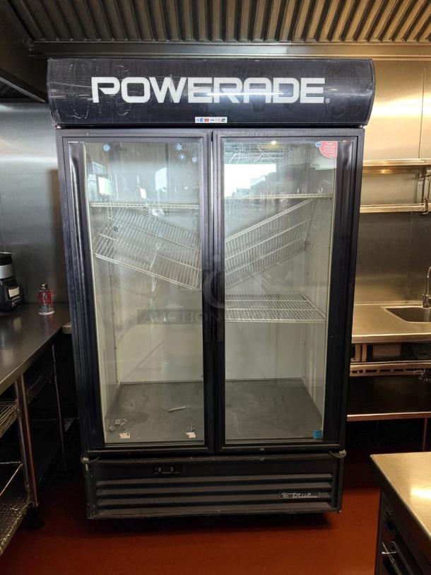 True GDM-43 two-section glass door merchandiser, white, left/right hinge doors, 47 1/8", tested/working, Powerade branding.